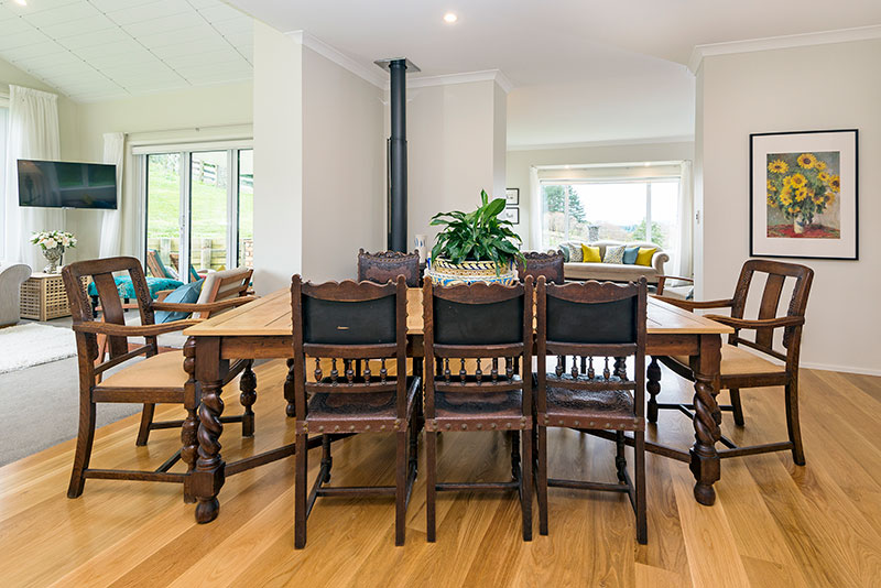 Dining area with lovely bespoke furniture in colonial style award winning home