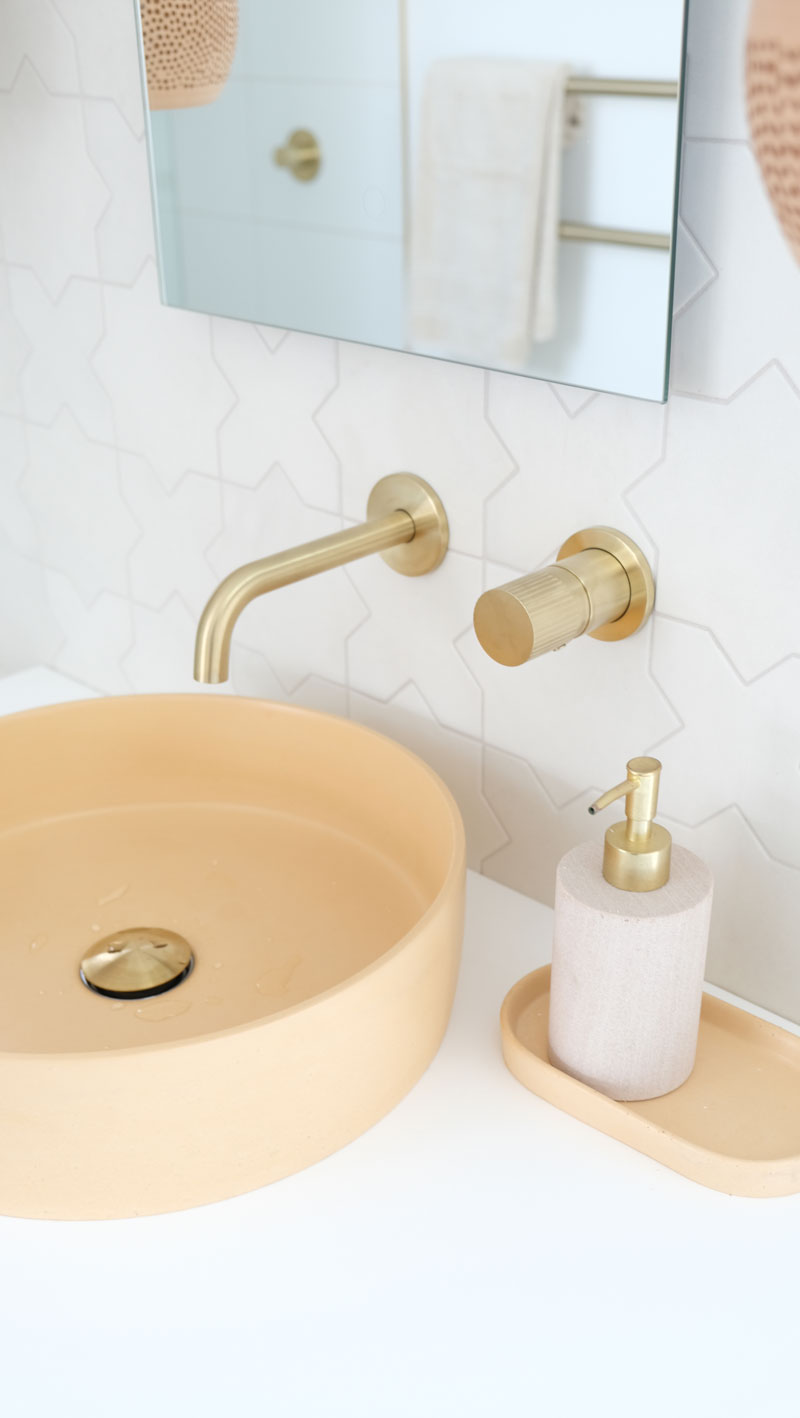 Gorgeous mediterranean/morrocan inspired bathroom with Bare Concrete Vessel Basin and Brass tapware Precision Homes showhome