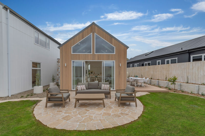 Gorgeous mediterranean inspired home with arched crazy paved patio, JSC Western Red Cedar cladding, Precision Homes showhome