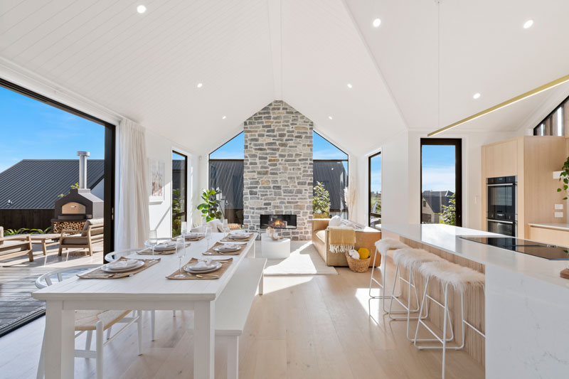 Stunning schist fireplace and open plan living space in our new showhome in Paerata Rise