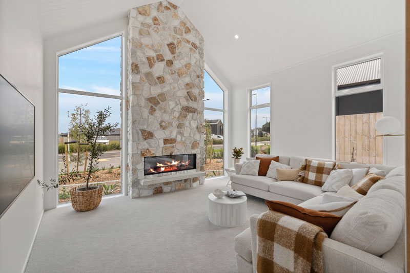 Gorgeous Med inspired home Irregular Stone Vintage white fireplace, angled windows, Precision homes showhome