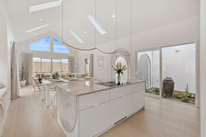 Gorgeous Med inspired home Taj Mahal Granite benchtop, vaulted ceilings with Velux Skylights, Precision homes showhome