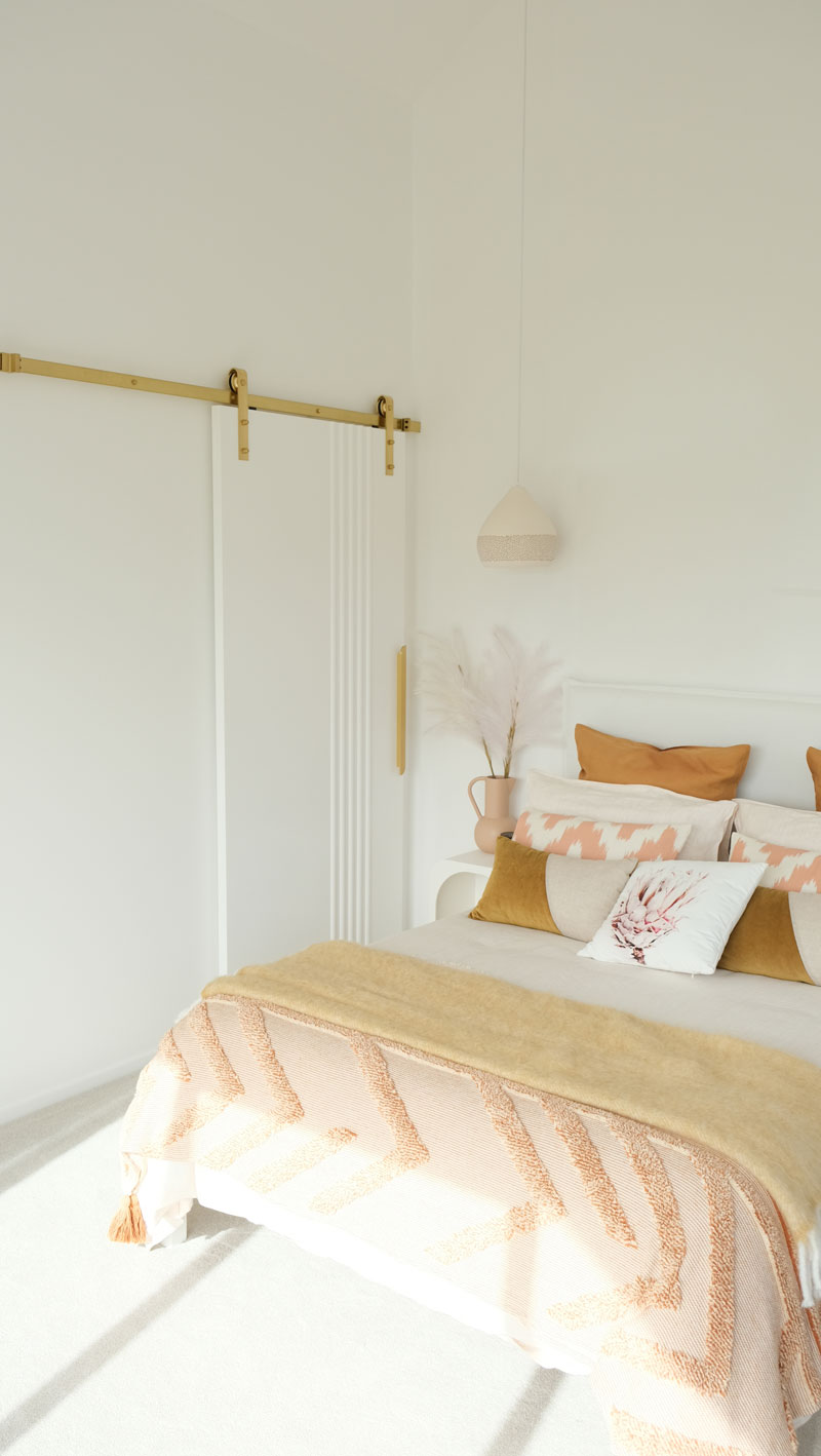 Gorgeous Med inspired home bedroom with barn door, brass fittings and vaulted ceilings, Precision homes showhome