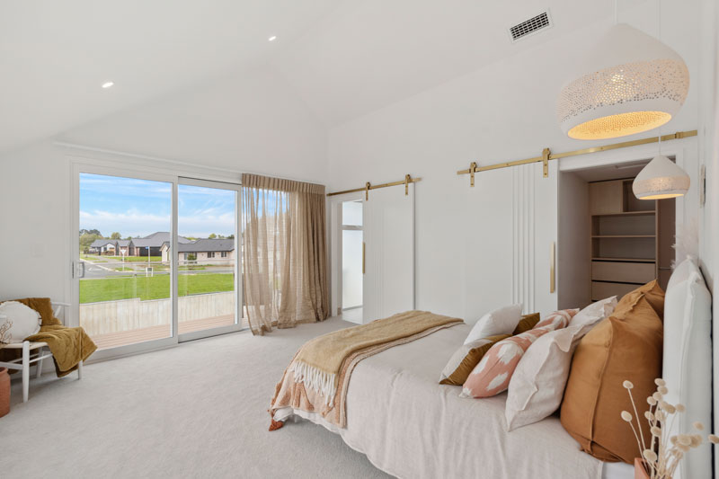 Gorgeous Med inspired home with barn doors, brass fittings, angled ceiling Precision Homes showhome