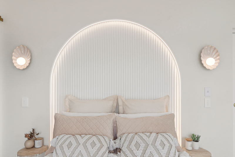 Gorgeous Med inspired home with arched panelled feature wall behind bed, Precision homes showhome