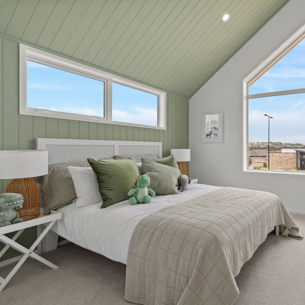 38 Te Rata Boulevard boys bedroom, green feature wall and ceiling, angled ceiling and window