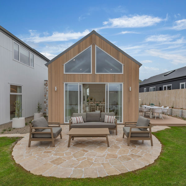 Precision Homes Showhome back yard, half round crazy paving patio, JSC western red cedar cladding