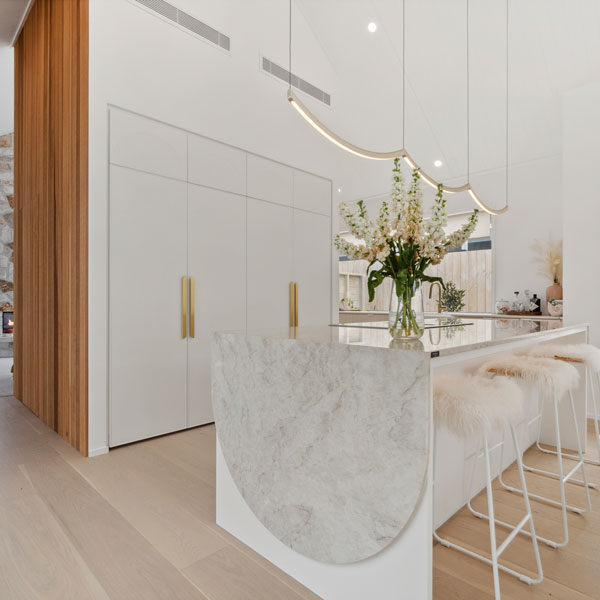 38 Te Rata Boulevard kitchen, arched rounded waterfall benchtop, nightworks light, designatek cabinets