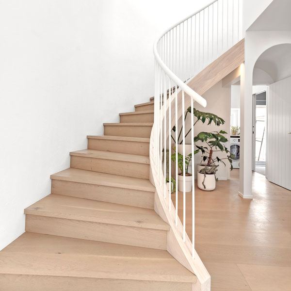 Precision Homes Showhome curved staircase, Hurfords timber floor, metal balustrade